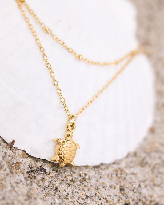Tortuga of the Sun anklet with double gold chains and delicate ocean turtle pendant