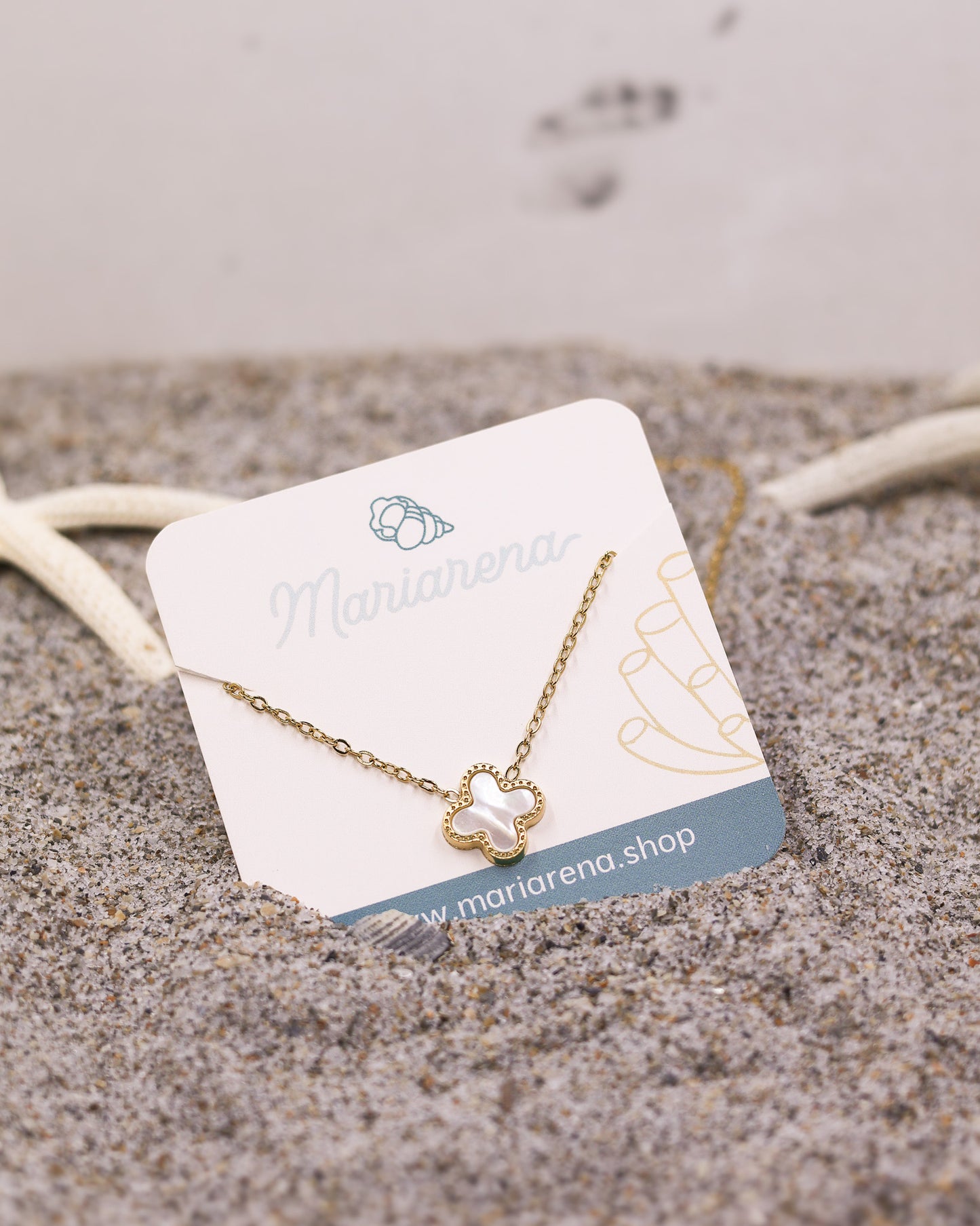 White Clover Glow Necklace with glossy charm and dainty waterproof gold chain
