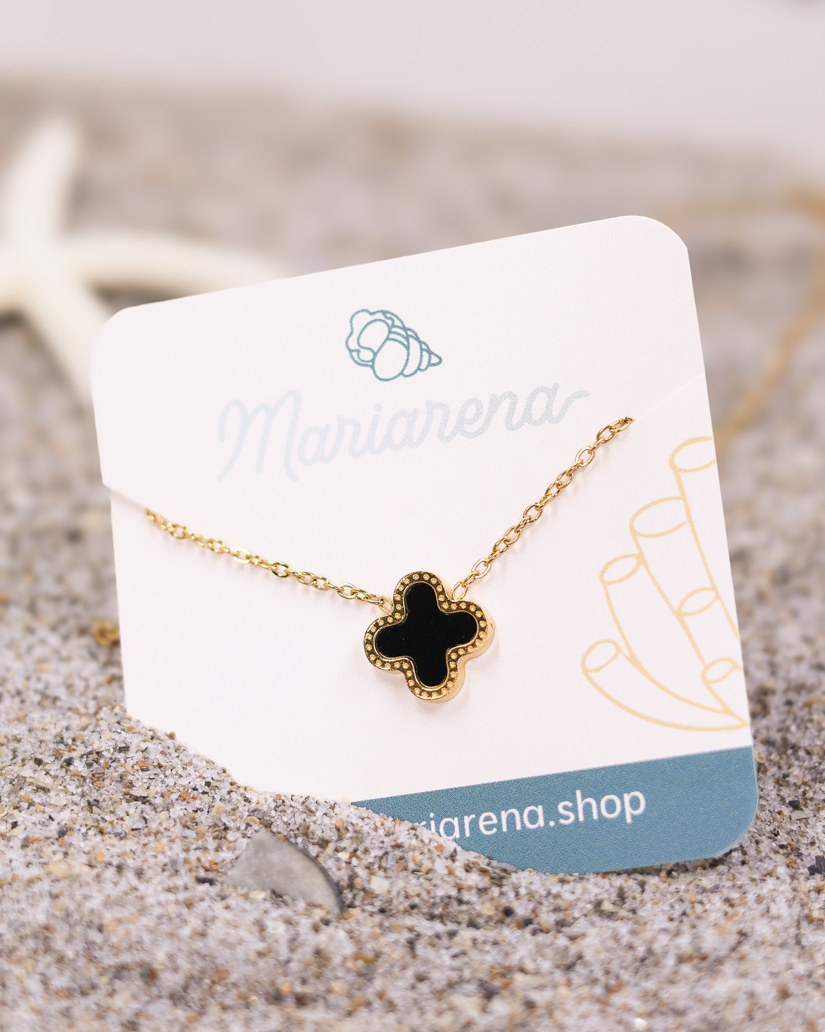 Midnight Clover Necklace with black enamel charm and dainty gold chain